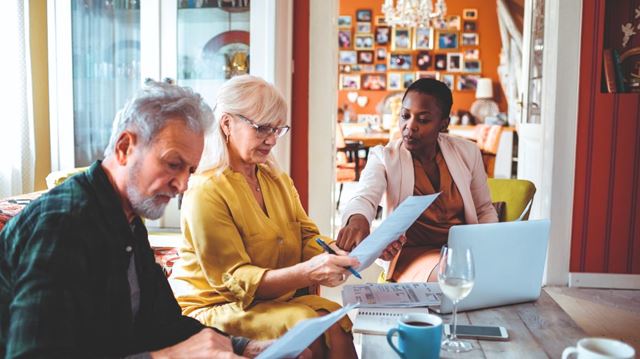 older couple with financial advisor